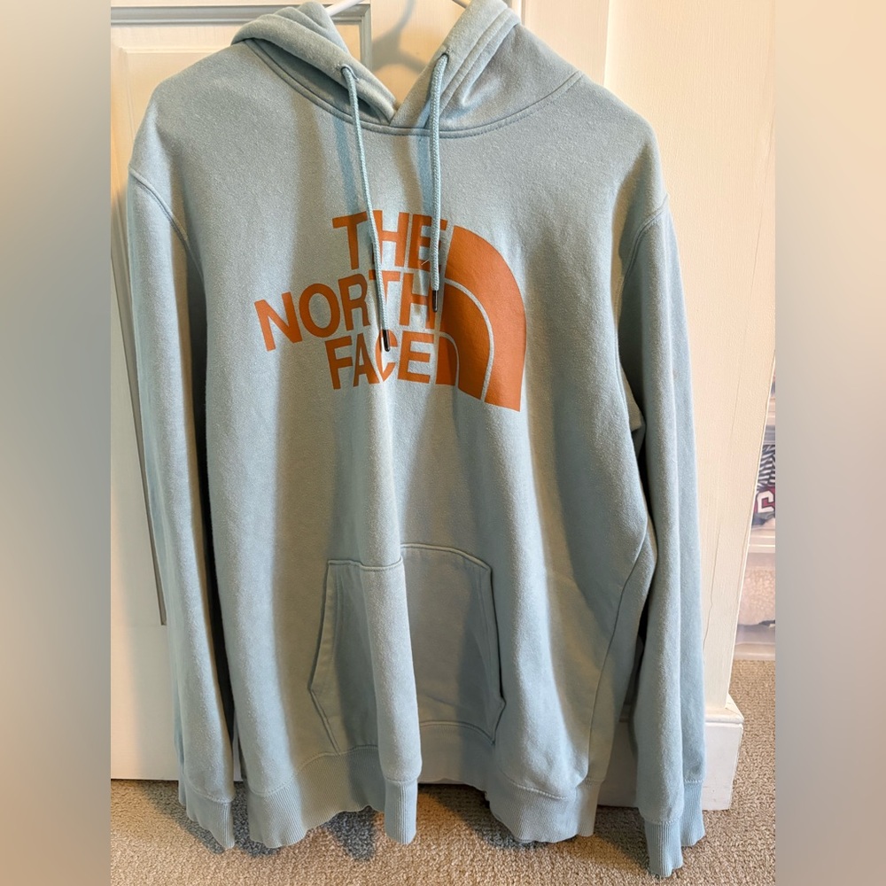 The North Face Men's Light Blue Hoodie with Orange Logo